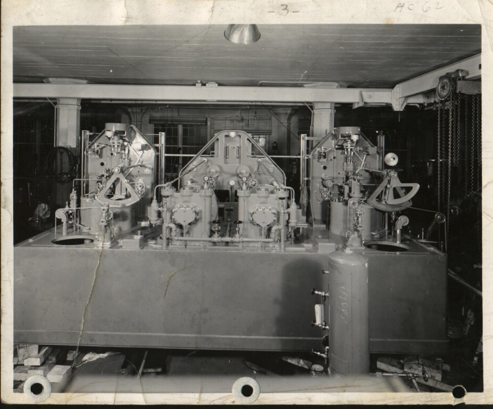 On the test stand a Woodward Twin Actuator Governor System in the Woodward GovernorCompany's factory on Mill Street in the water power disctrict     Circa 1940 